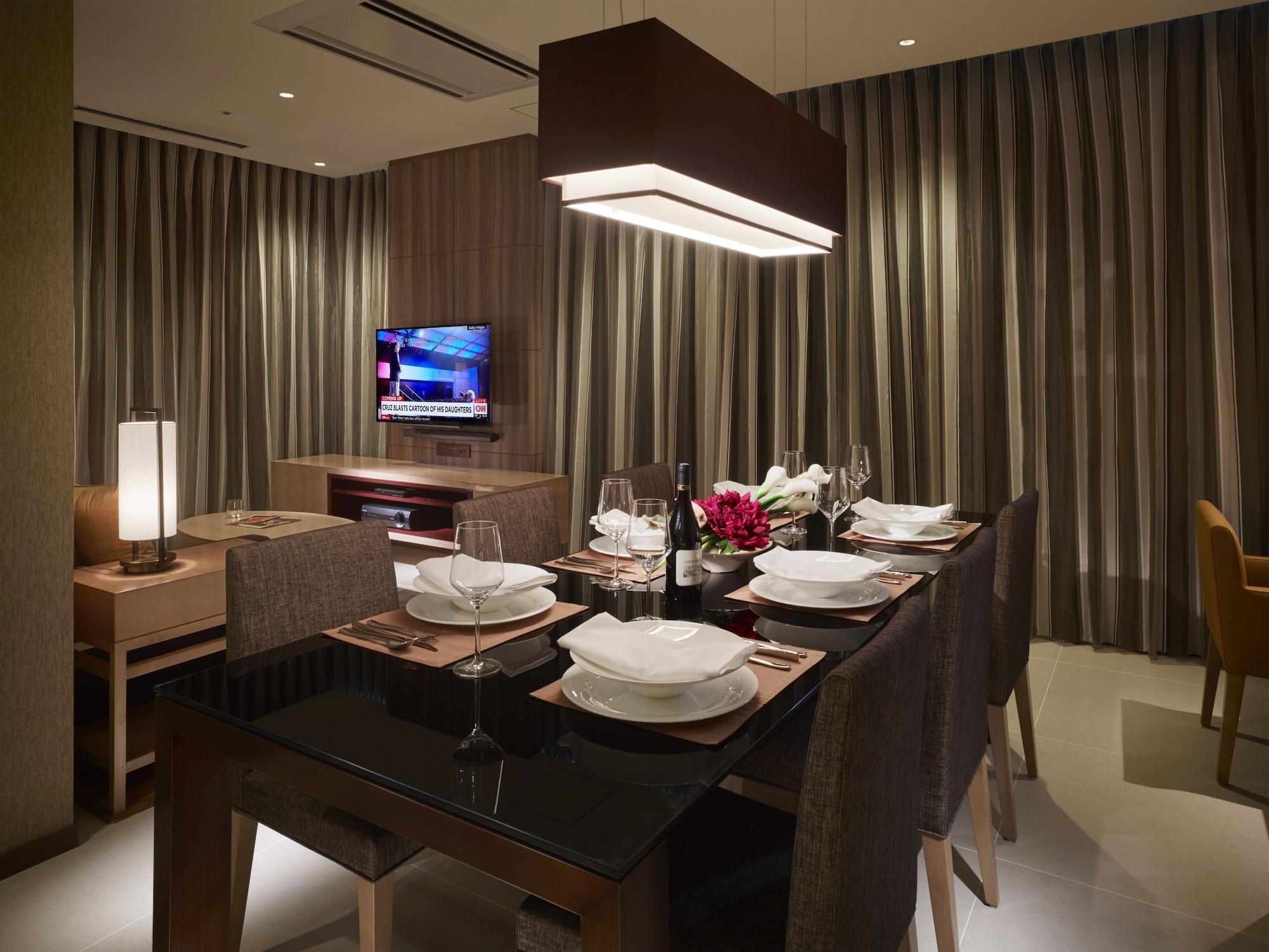 Hotel Oakwood Premier Prefektura Tokio Exteriér fotografie A dining room in a hotel suite