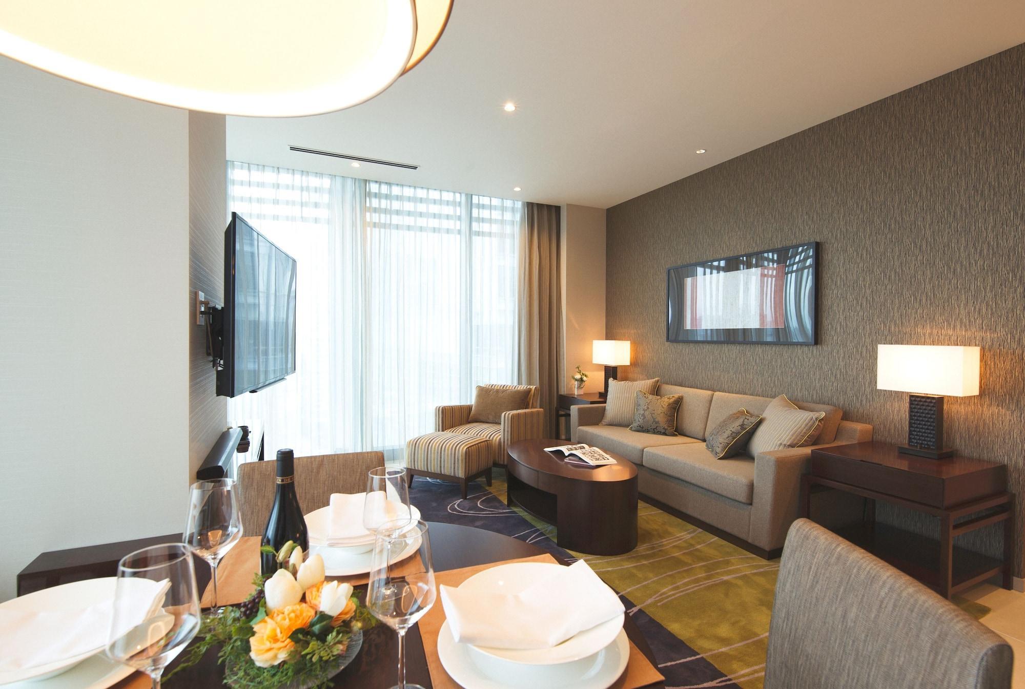 Hotel Oakwood Premier Prefektura Tokio Exteriér fotografie A living room at the hotel