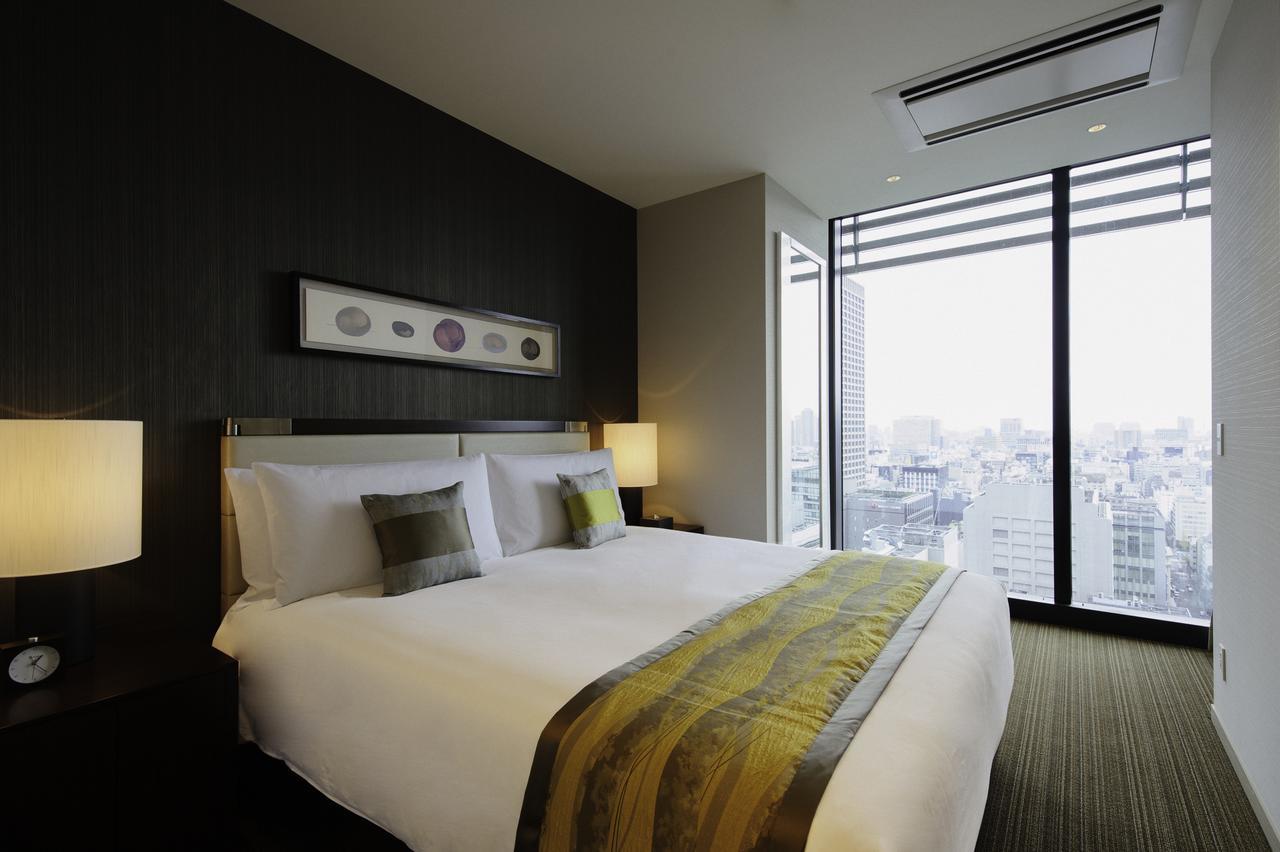Hotel Oakwood Premier Prefektura Tokio Exteriér fotografie A bedroom at the hotel