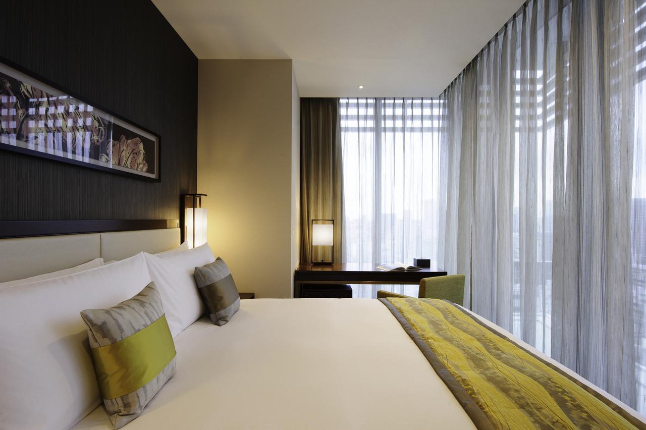 Hotel Oakwood Premier Prefektura Tokio Exteriér fotografie A bedroom at the hotel
